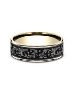 The Spur This 8mm comfort fit ring is made with Grey Tantalum and 14k yellow gold, featuring a barrel script design