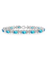 Silver Oval Shape Blue Topaz Gemstone & 1/10CTW Diamond Bracelet