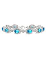Nancy Silver Oval Blue Topaz Shape Gemstone & 1/10CTW Diamond Bracelet
