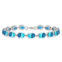 Sherri Silver Oval Shape Blue Topaz Gemstone & 1/10CTW Diamond Bracelet