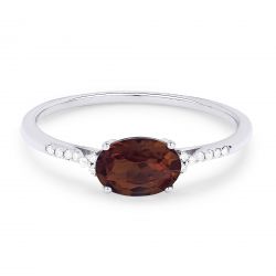 Front view diamond and garnet fashion ring white gold